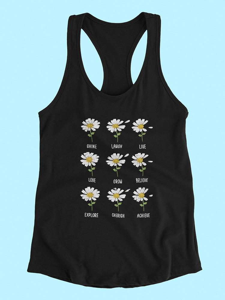 a black tank top with white flowers on it