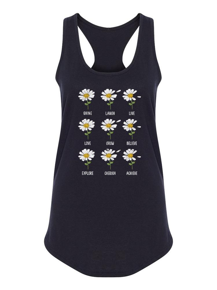 a black tank top with white flowers on it