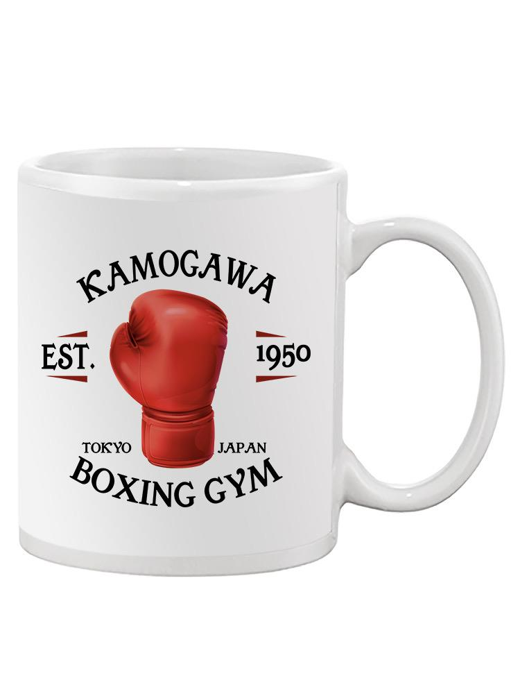 a white mug with a red boxing glove