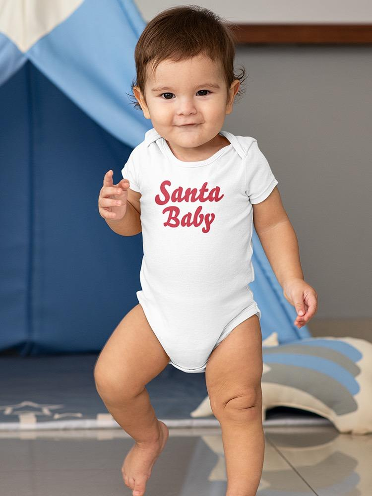 a baby standing in front of a tent