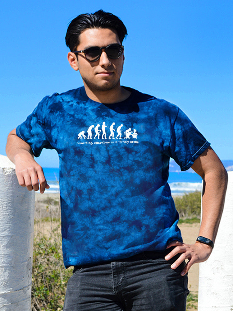a man wearing sunglasses and a blue shirt