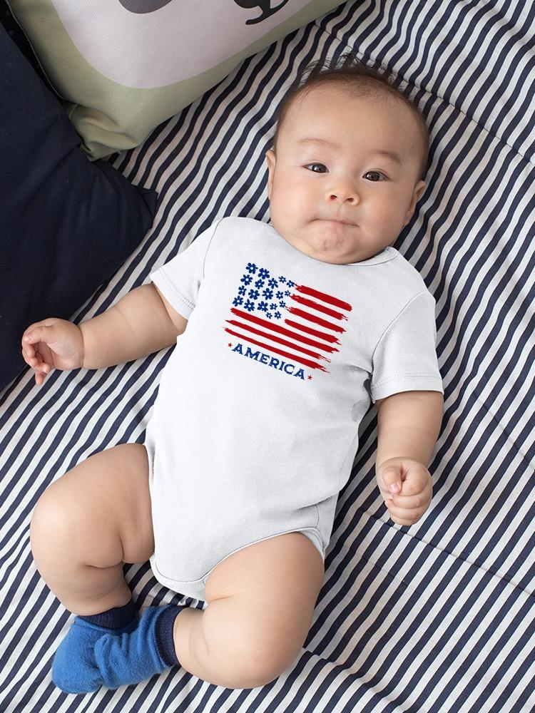 a baby lying on a bed