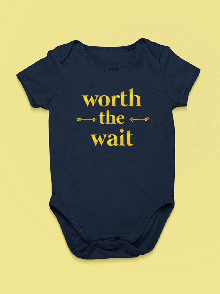 a blue baby bodysuit with yellow text