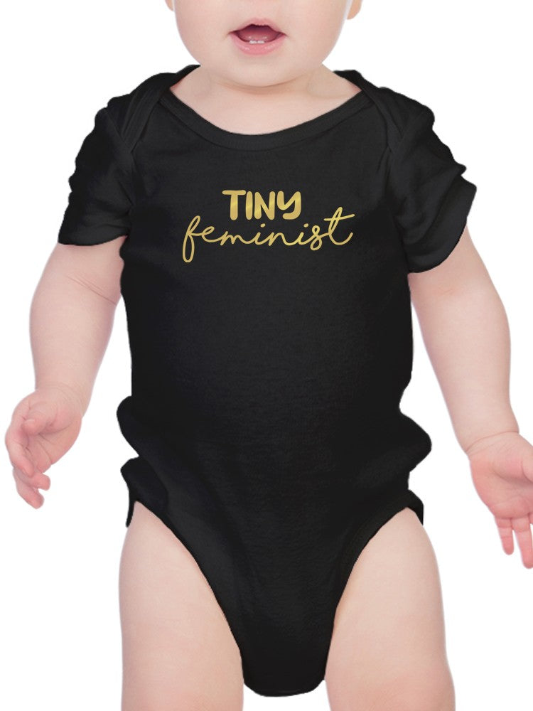 a baby wearing a black shirt