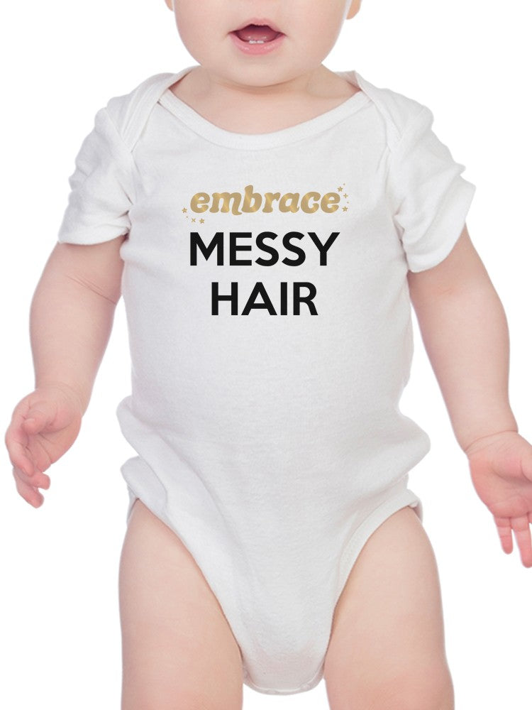 a baby in a white bodysuit
