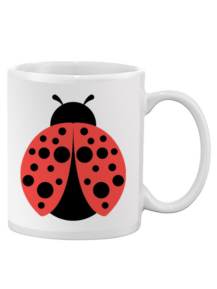 a white mug with a ladybug on it