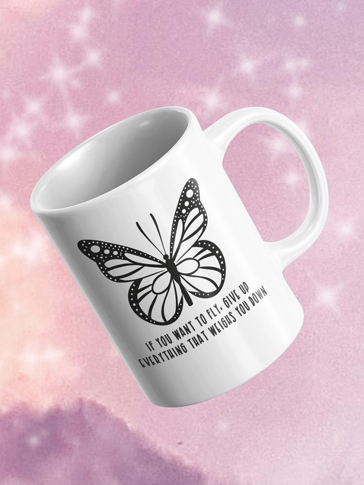a white mug with a butterfly on it