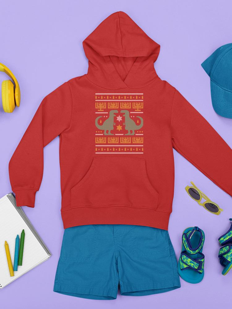 a red hoodie with a dinosaur design on it and a pair of blue shorts