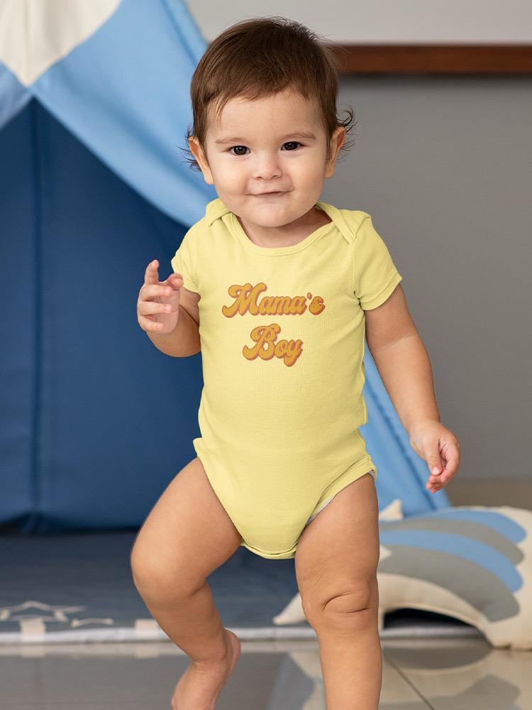 a baby standing in front of a blue and white tent
