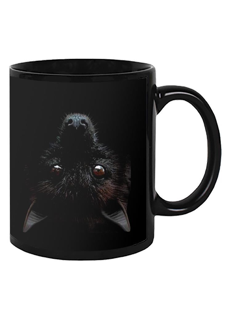 a black mug with a black background