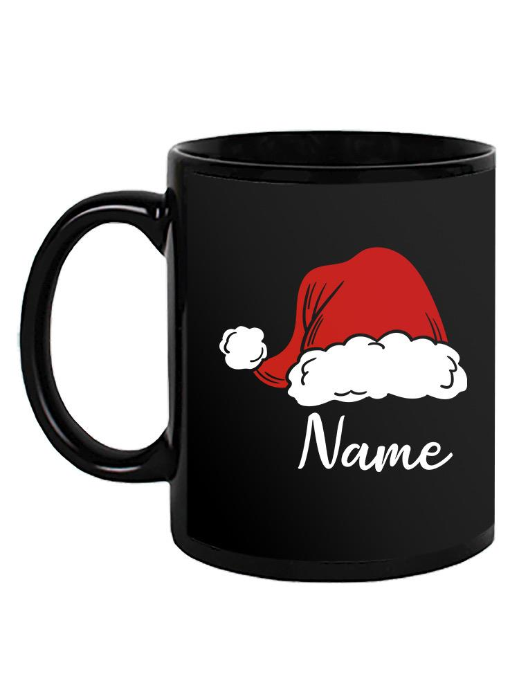 a black mug with a red hat and white text