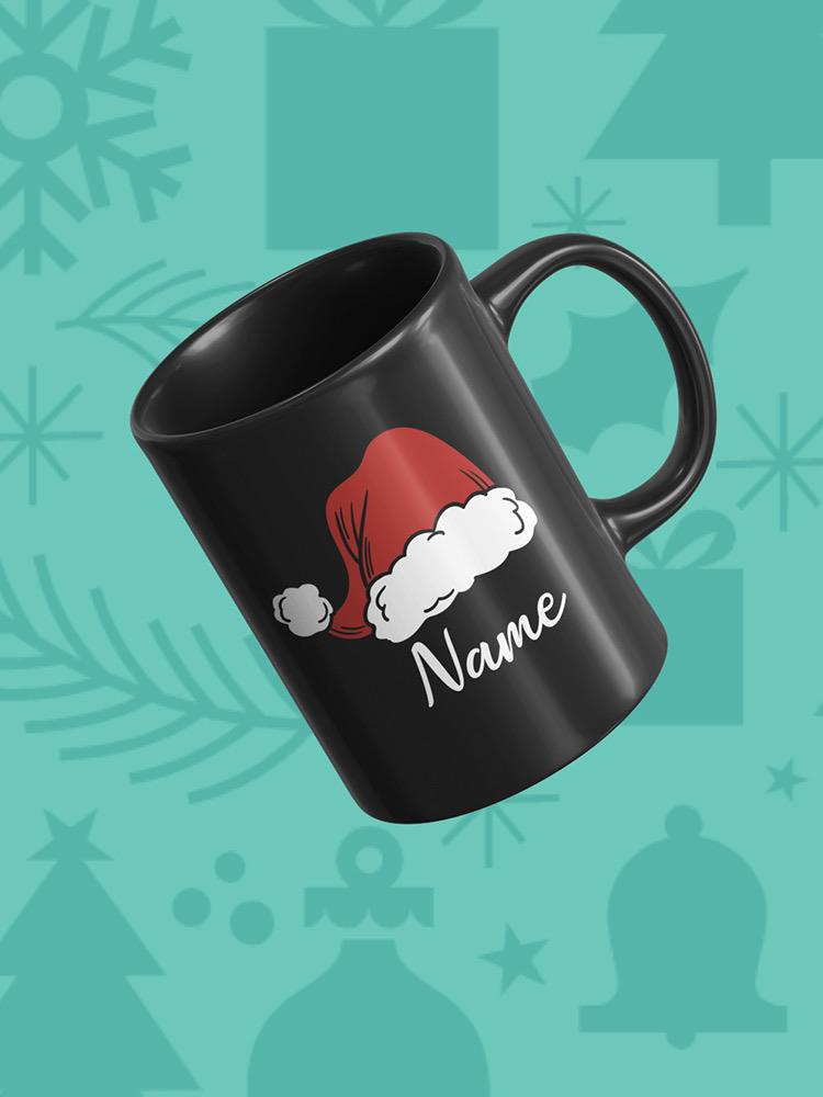 a black mug with a red hat and white text