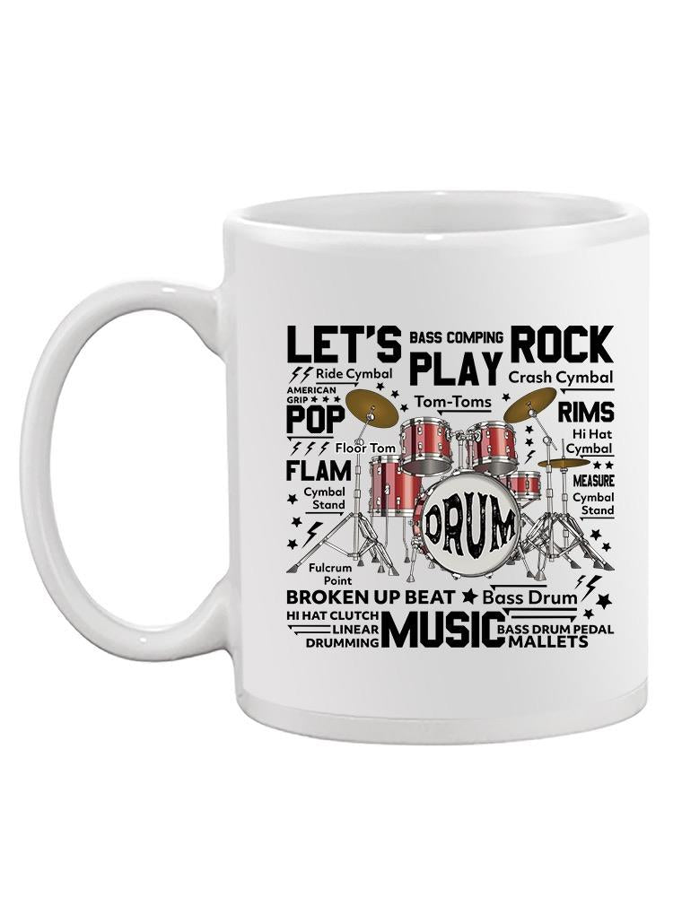 a white mug with a drum set