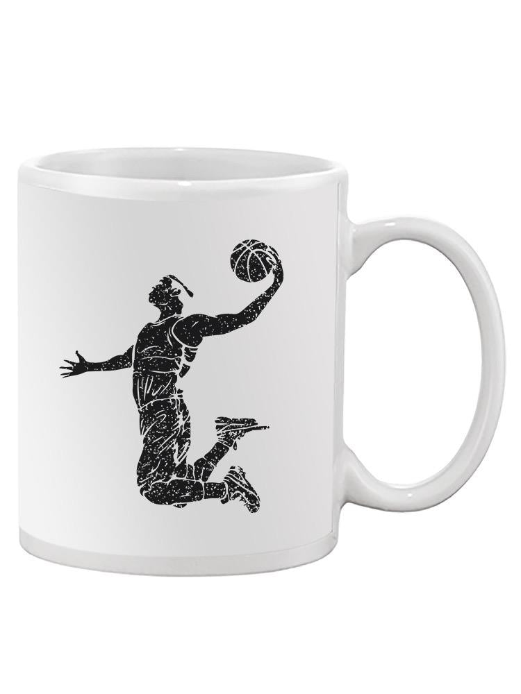 a white mug with a basketball player in the air