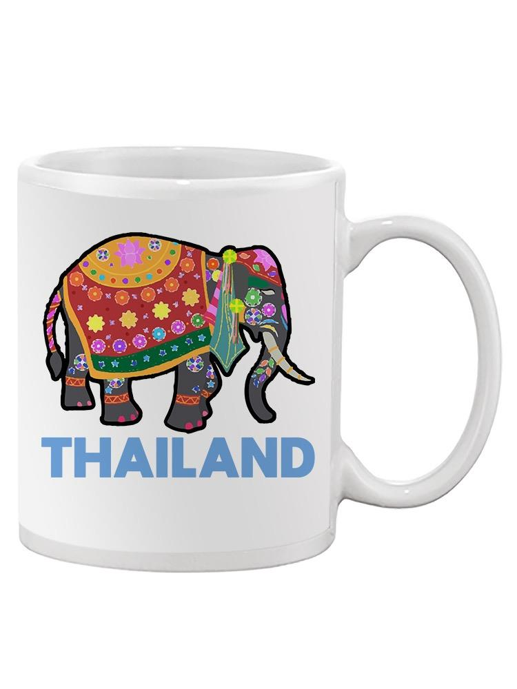 a white mug with an elephant painted on it