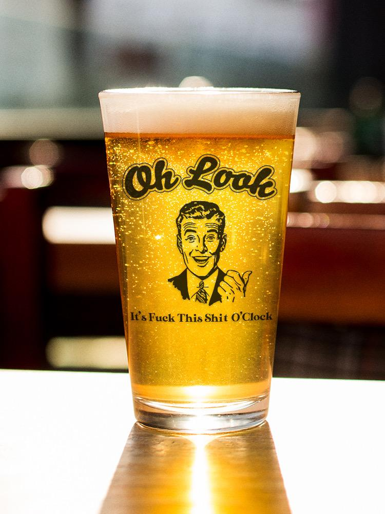 a glass of beer on a table