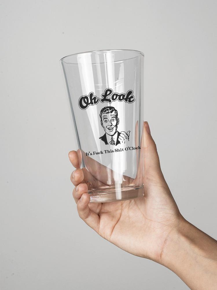 a hand holding a glass