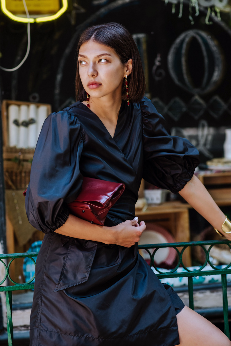 a woman in a black dress