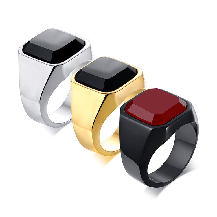 a group of rings with a square stone