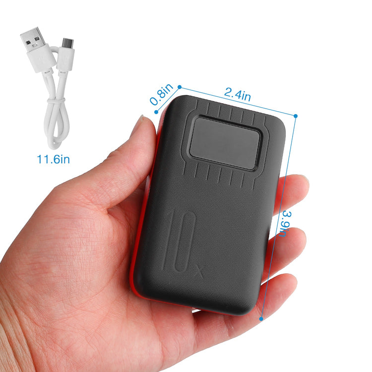 a hand holding a device