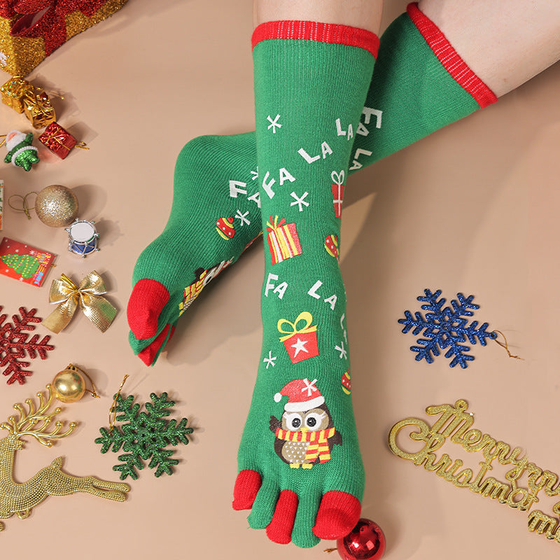 a person's feet with socks and ornaments