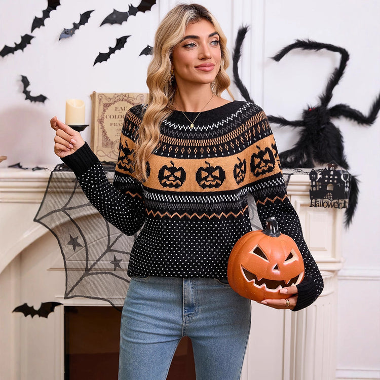 a woman holding a pumpkin and a candle
