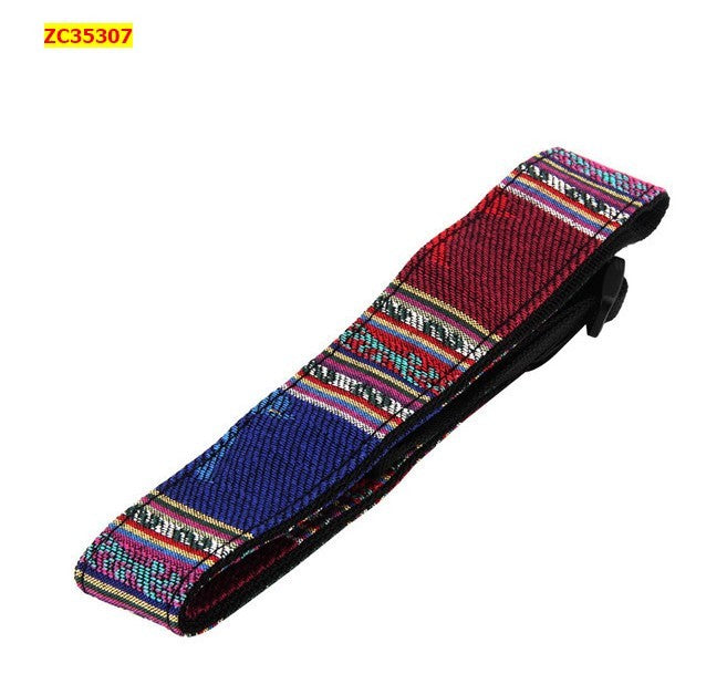 a colorful strap with a black zipper