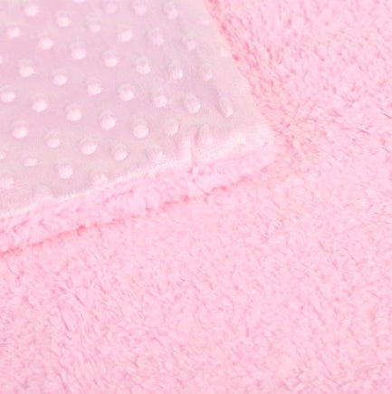 a pink blanket with a square