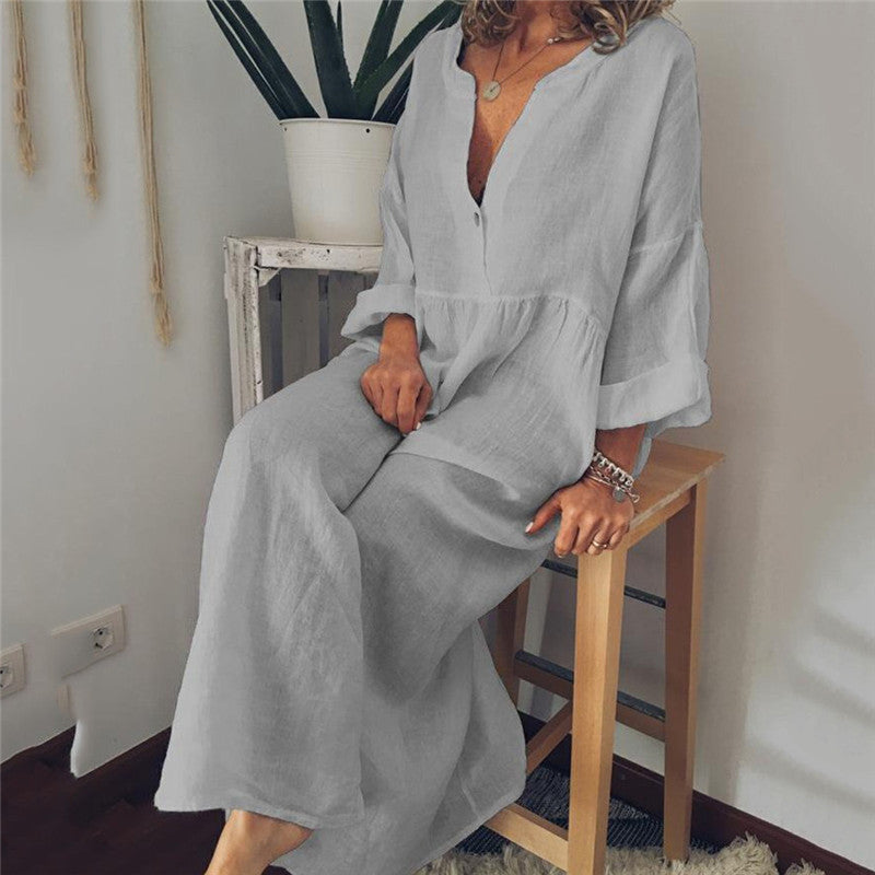 a woman sitting on a stool