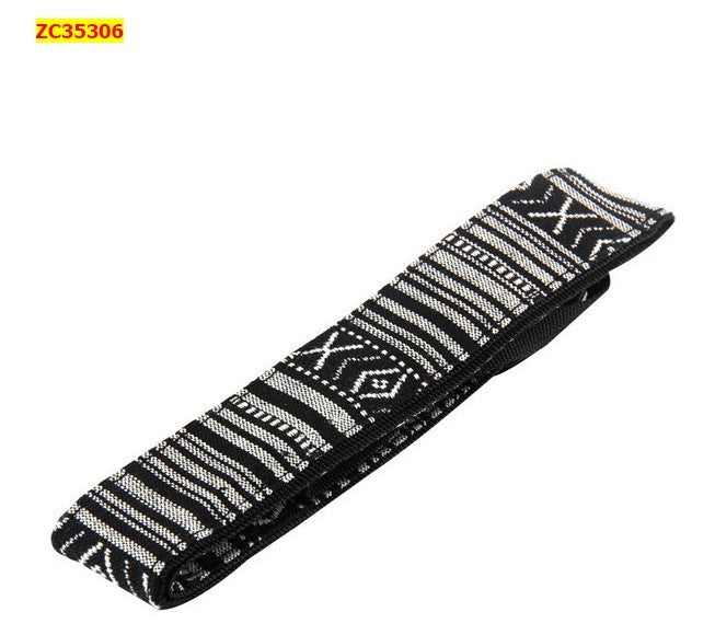 a black and white fabric strap