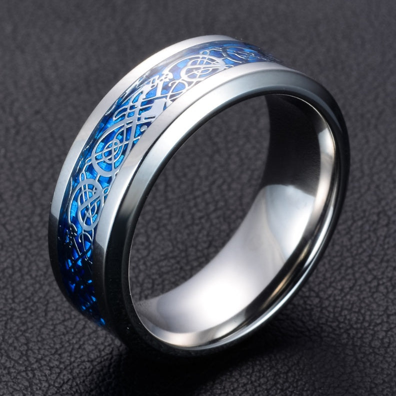 a silver ring with blue enamel