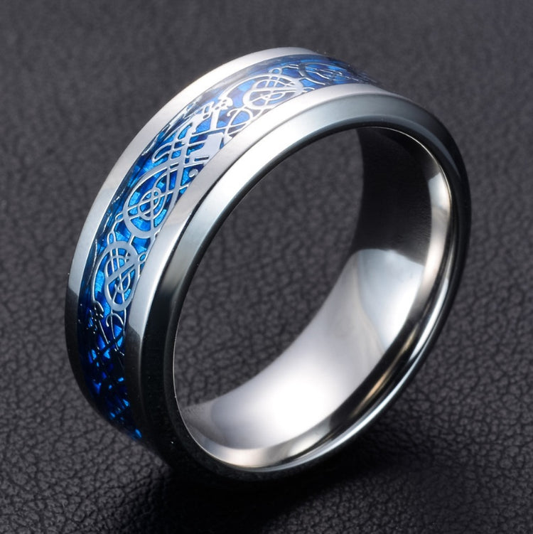 a silver ring with blue enamel