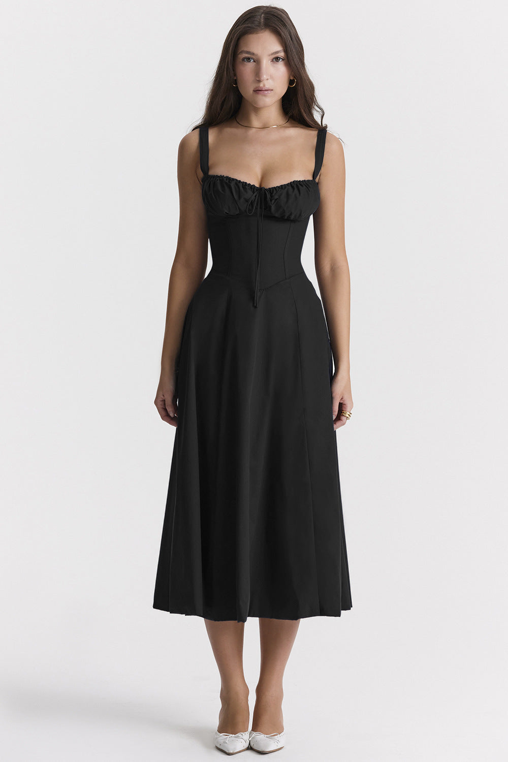 a woman in a black dress