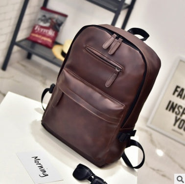 a brown backpack on a table