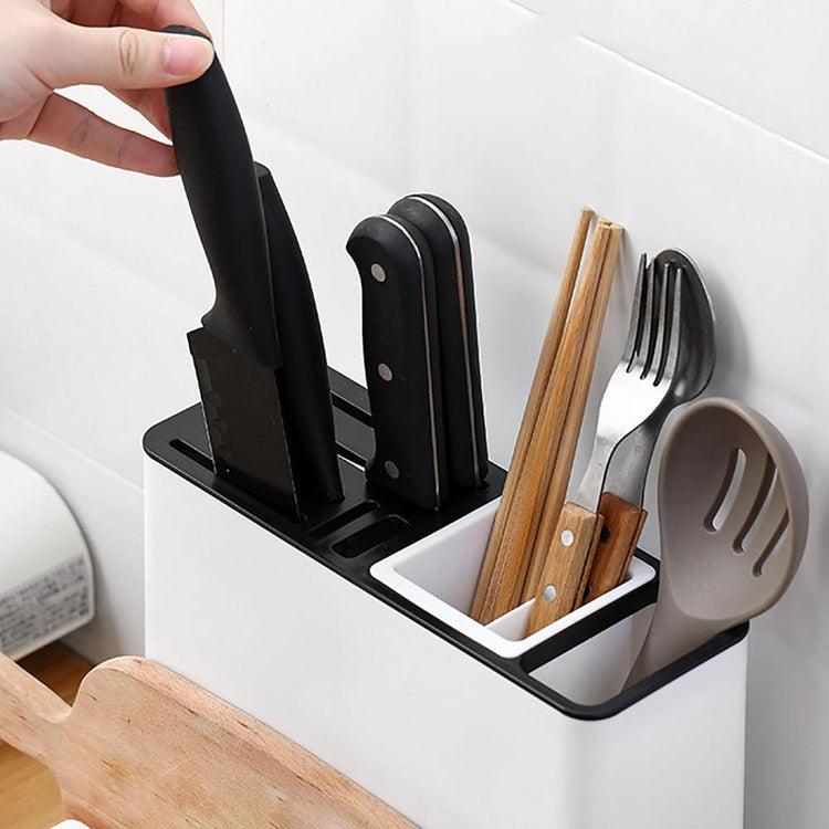 a knife and fork in a knife holder