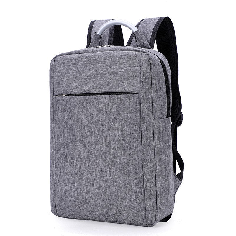 a grey backpack with a white handle