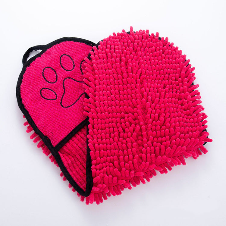 a pink mitt with a paw print