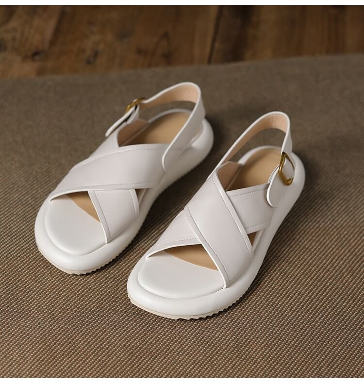 a pair of white sandals