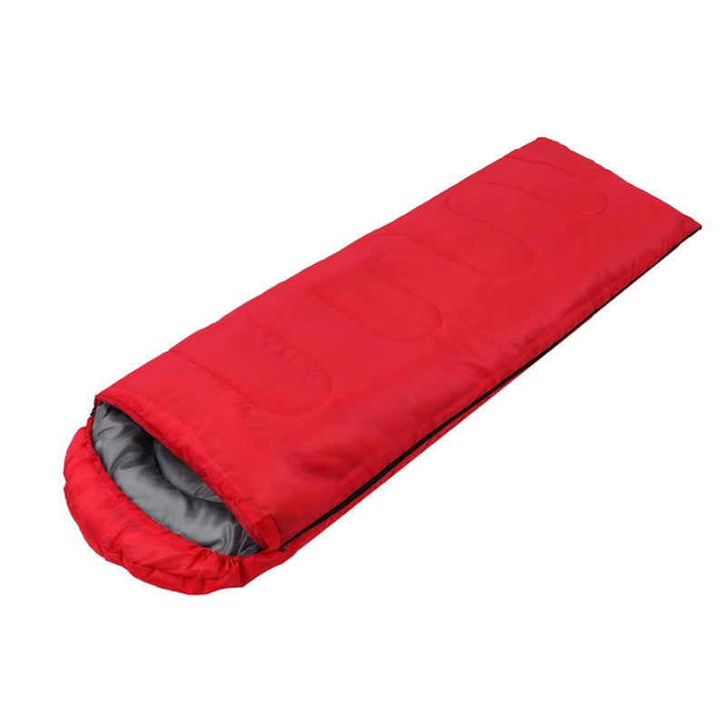 a red sleeping bag with a grey cover