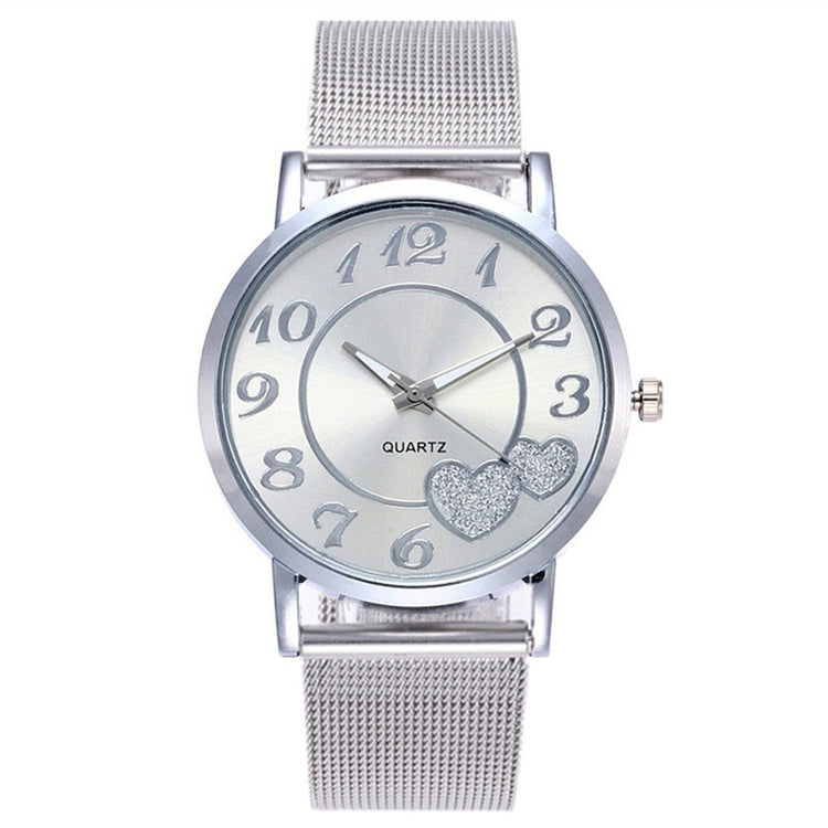 a silver watch with a silver band