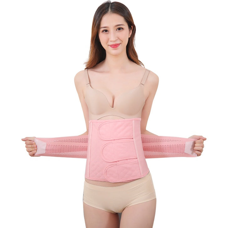 a woman wearing a pink corset