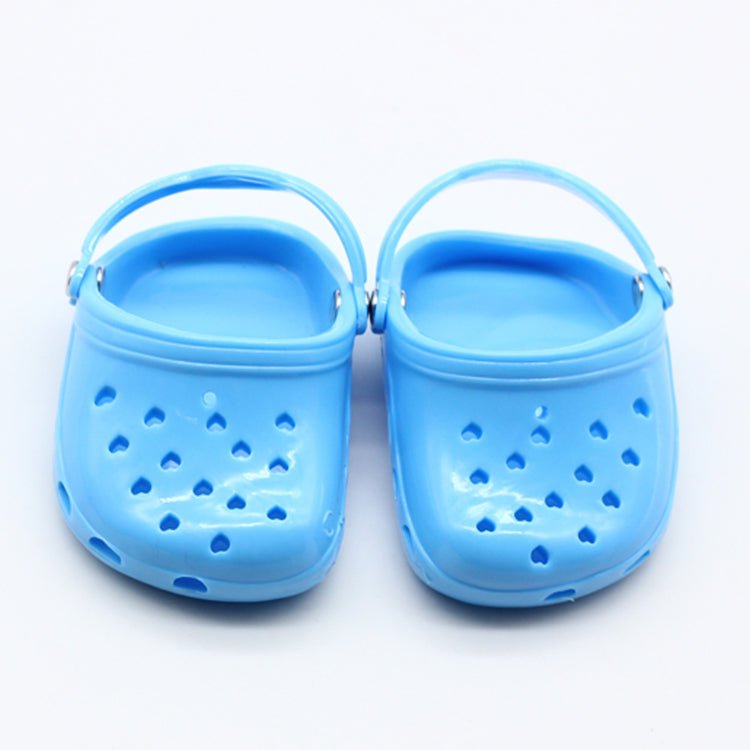 a pair of blue plastic shoes