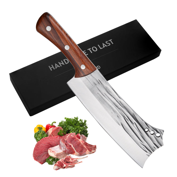a knife with a wooden handle next to a black box with meat