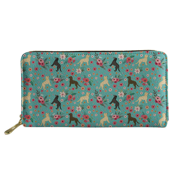 a blue wallet with dogs and flowers