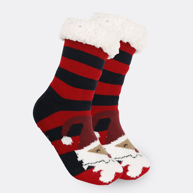a pair of red and black striped socks with a santa face