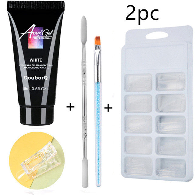 a black tube of gel and a brush