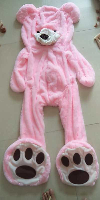 a pink garment on a tile floor