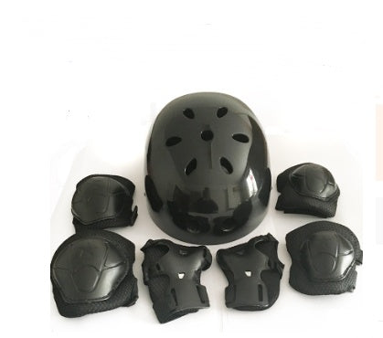 a black helmet and knee pads