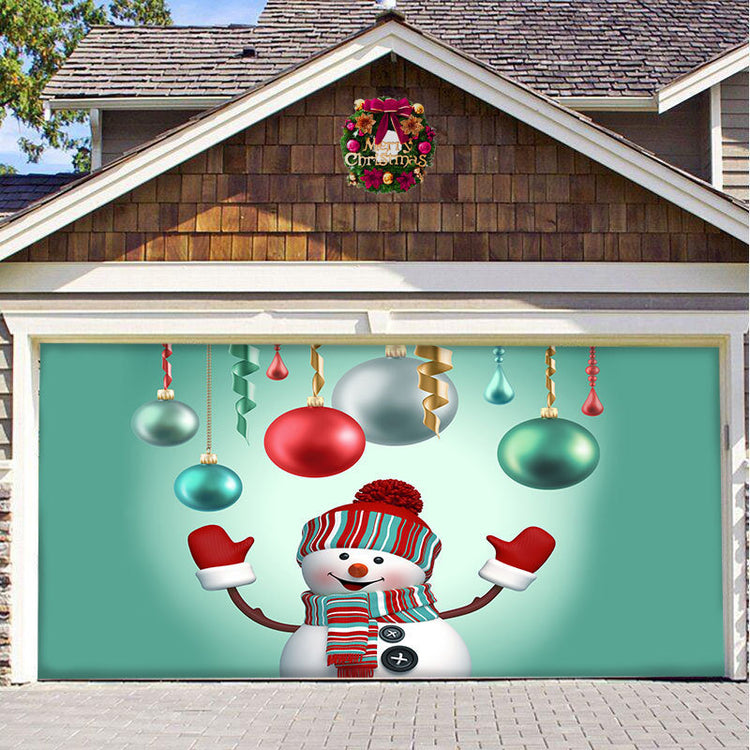 a garage door with a snowman and ornaments
