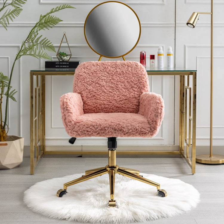 a pink chair with a round mirror on top of a white rug